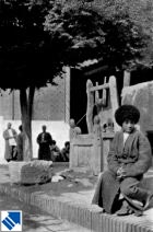 Historic view of pilgrims in the Pakhlavan Mahmoud Mausoleum courtyard