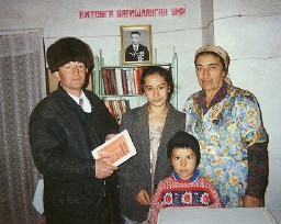 Joseph Tashpulatov's grand-daughter with some of her family and a local tourist guide